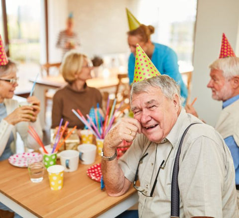 Neighbors throw 80-year-old man surprise birthday party during