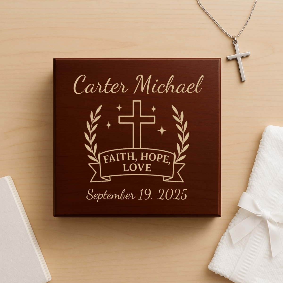 Customized baptism keepsake box with engraved name and baptism date, a cross, and meaningful quote 'Faith, Hope, Love'