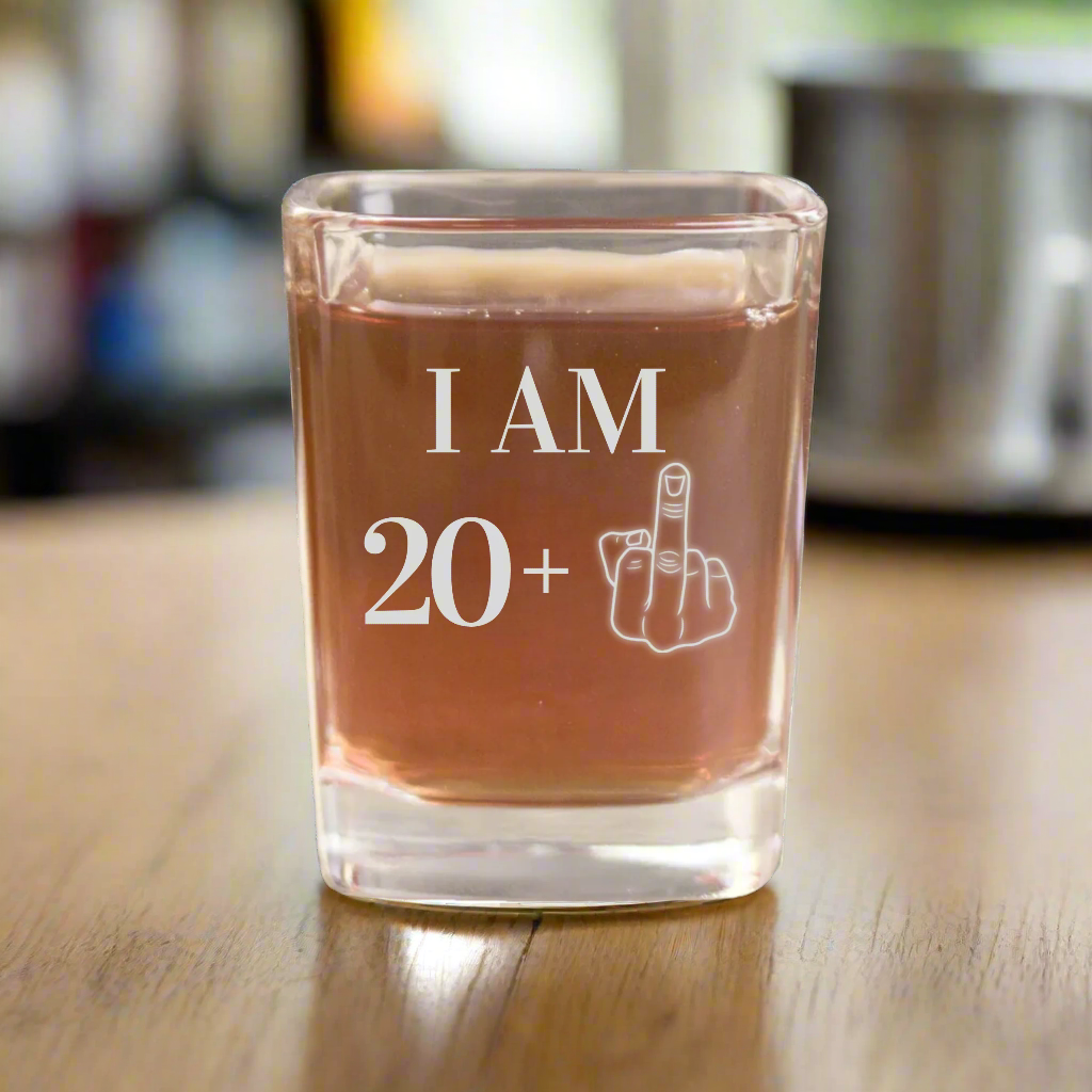 Funny 21st birthday shot glass engraved with I Am 20 plus middle finger