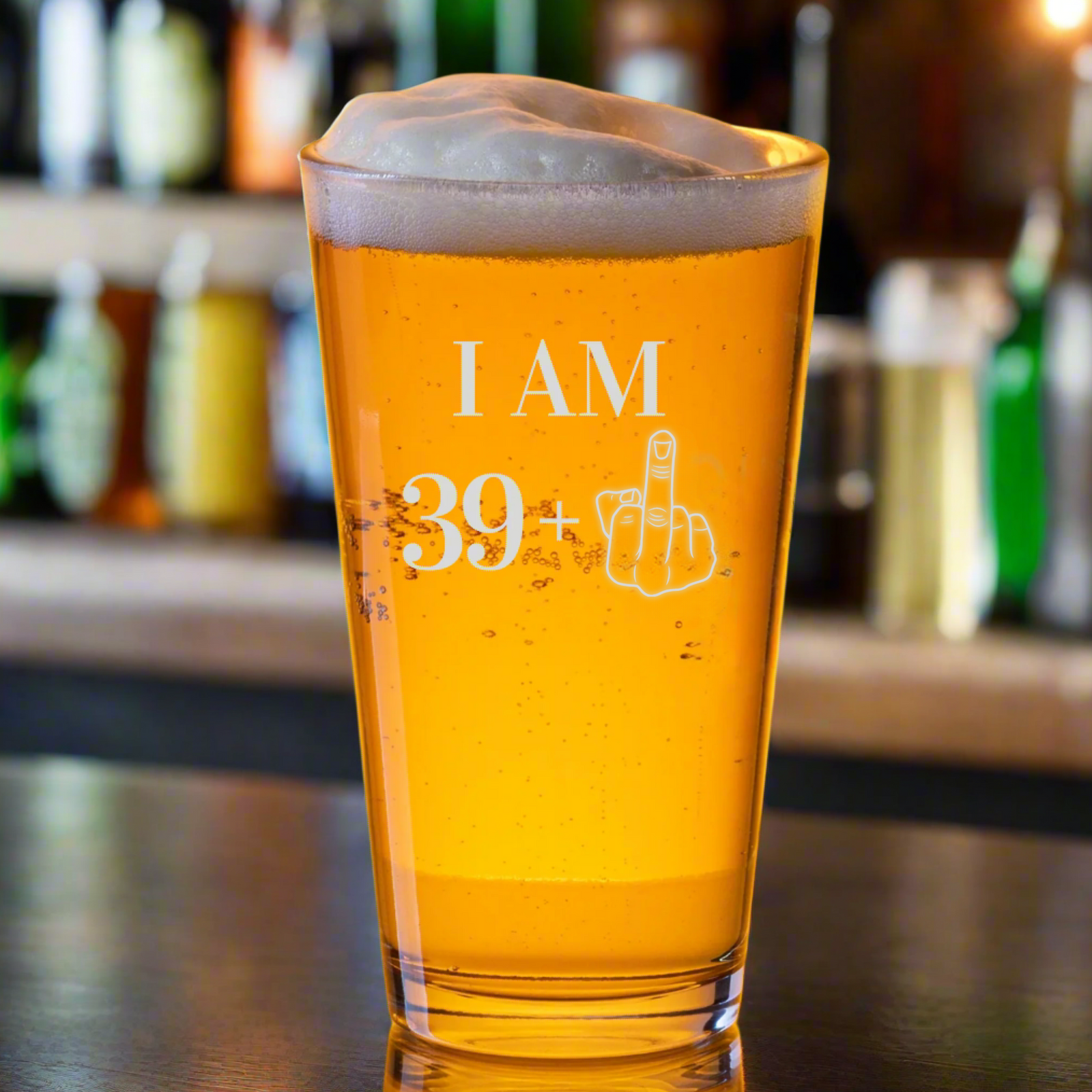 40th birthday pint glass with “I AM 39+” and middle finger