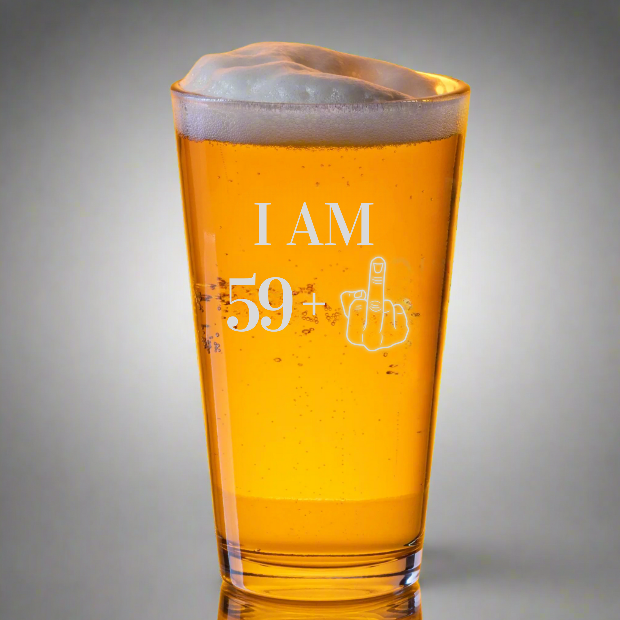 60th birthday pint glass with humorous "I AM 59+" message