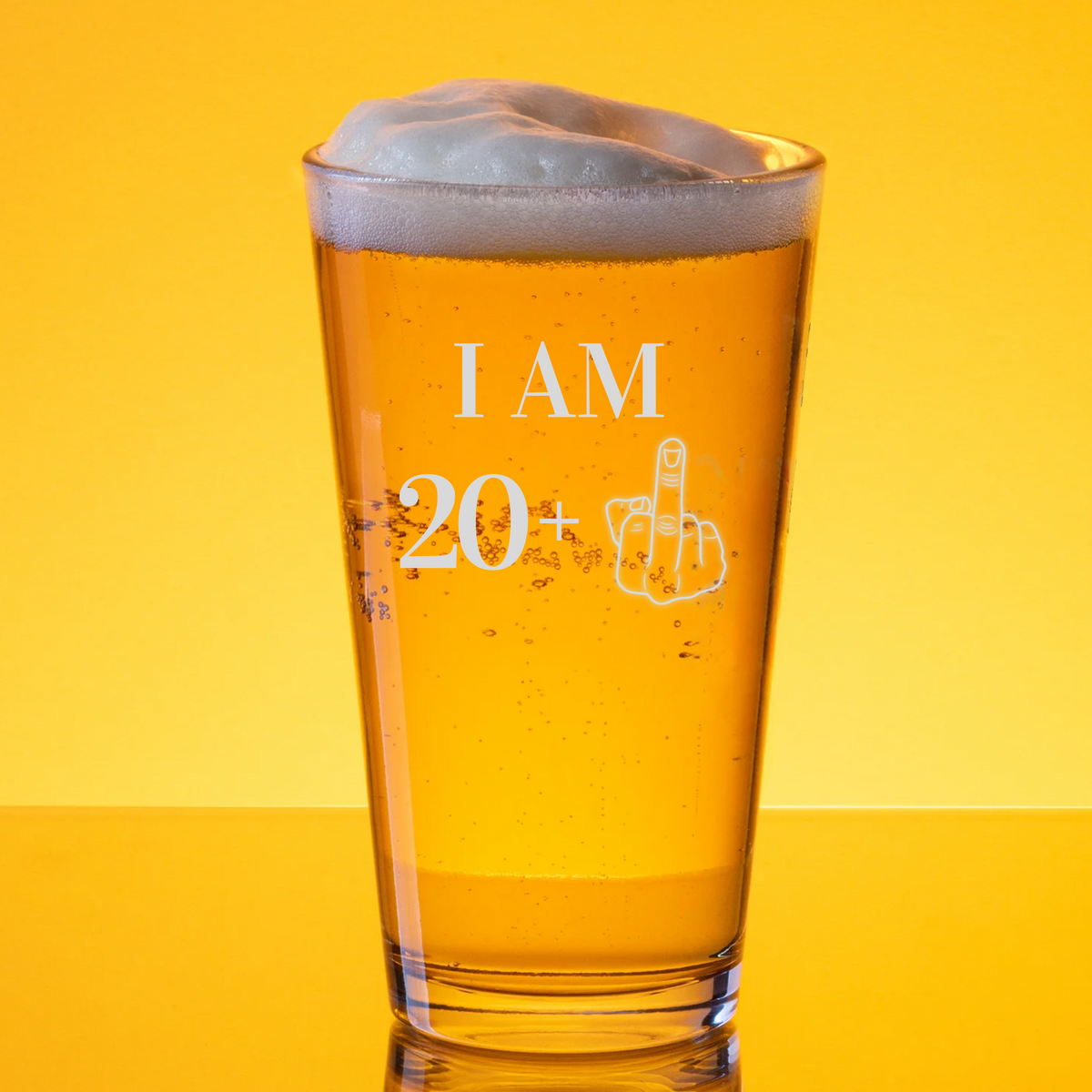 21st birthday pint glass with “I AM 20+” and middle finger