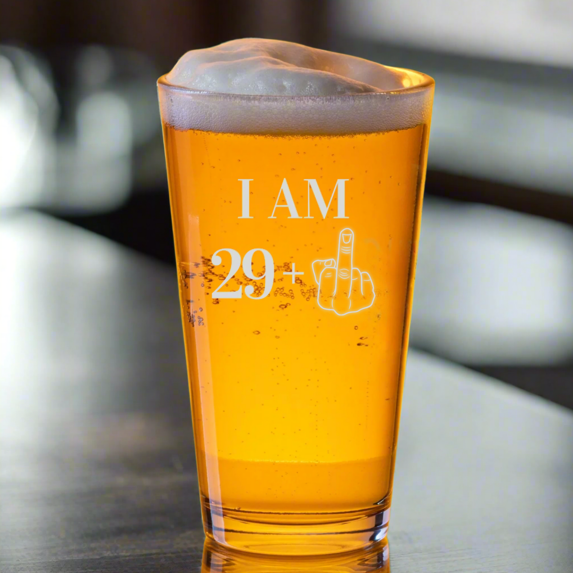 30th birthday pint glass with “I AM 29+” and middle finger