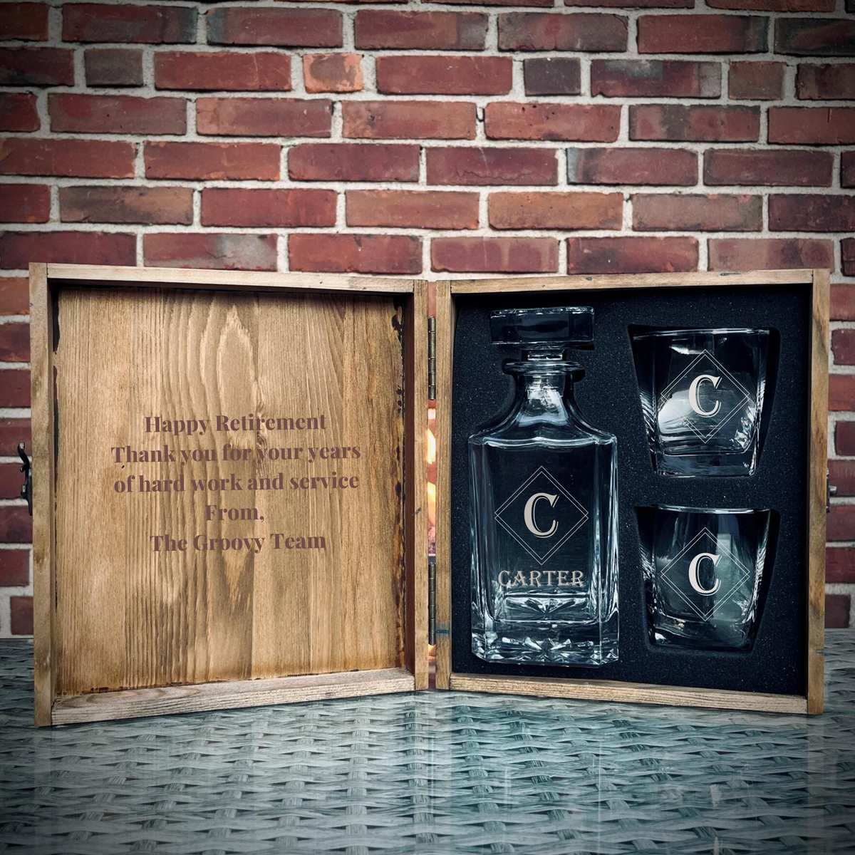 Personalized retirement decanter gift set with engraved decanter, glasses, and wooden box