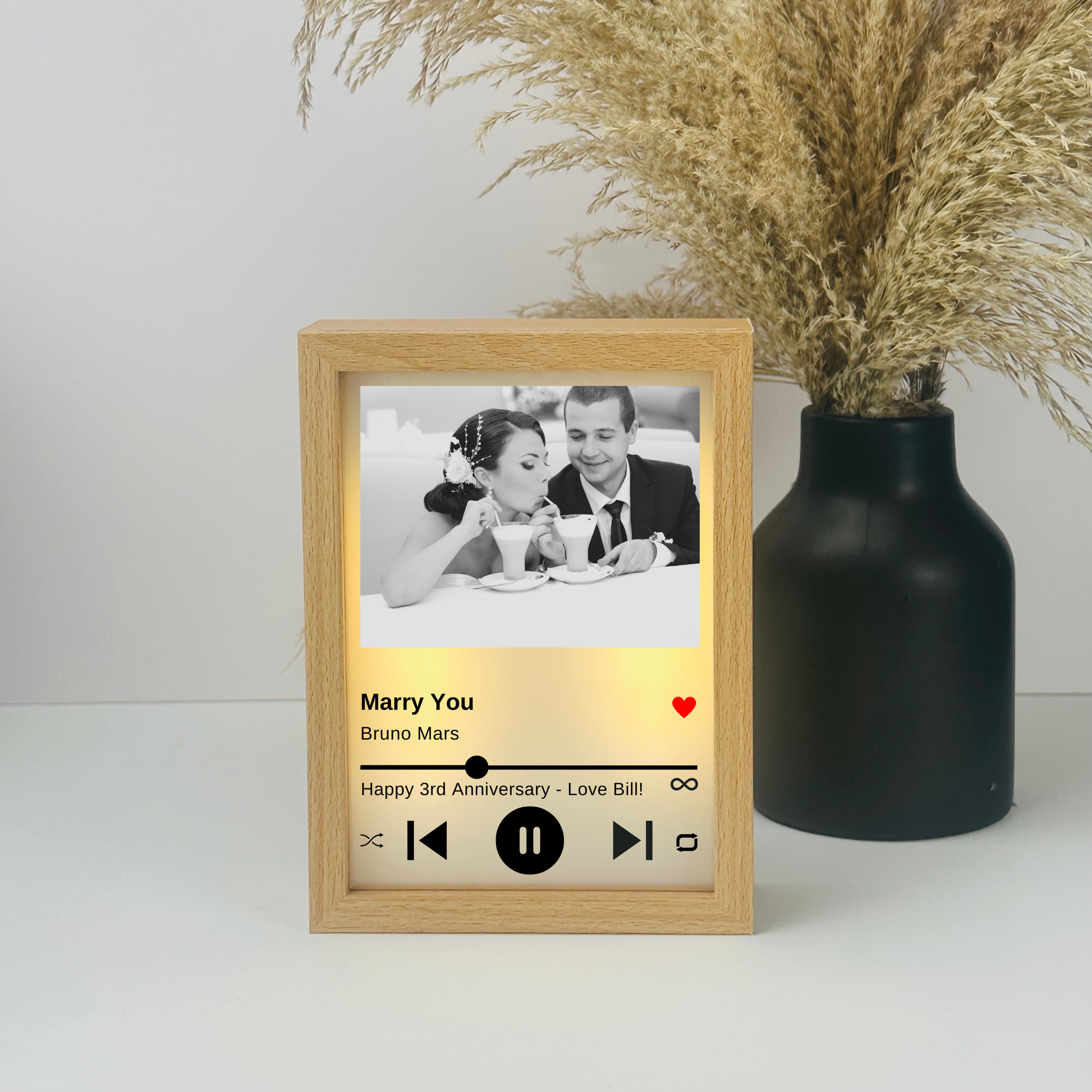 Personalized music light box featuring a custom photo, song name, and message on a sleek wood and acrylic frame – perfect for Valentine’s Day, anniversaries, weddings, or birthdays.