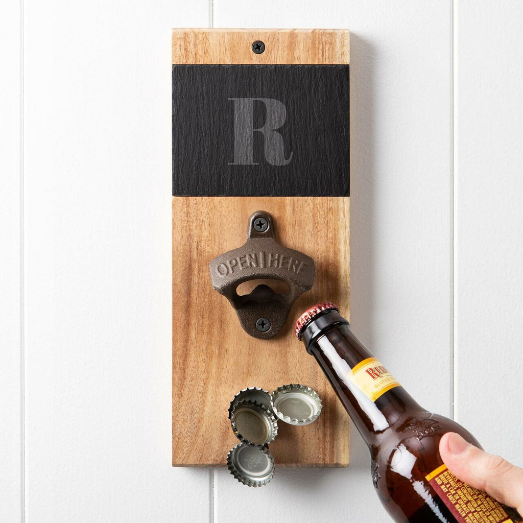 Custom wall outlet mounted bottle opener with cap catch.