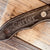 Closeup of engraved handle