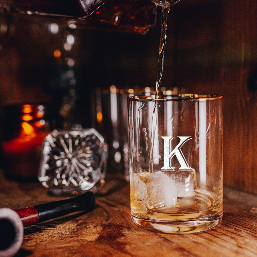 Gold rimmed whiskey glasses with personalized monogram initials